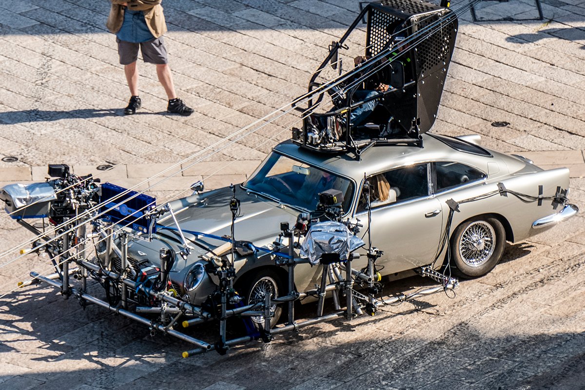In this Sept. 12, 2019 photo, actor Daniel Craig is partially seen, left, sitting inside one of the Aston Mar-tin DB5 used on the set of the latest James Bond movie “No time to die” in Matera, southern Italy. The film was Craig’s final appearance in the longstanding movie franchise and producers are now seeking the next actor to star in the role.